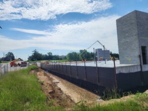 Aerial view of BestBox Storage in Lake St. Louis, Missouri—a multilevel self-storage facility with a basement, featuring a modern, suburban-style design that blends into the surrounding landscape.