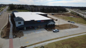 Aerial view of BestBox Storage in Lake St. Louis, Missouri—a multilevel self-storage facility with a basement, featuring a modern, suburban-style design that blends into the surrounding landscape.