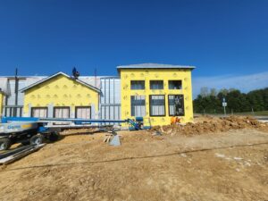 Aerial view of BestBox Storage in Lake St. Louis, Missouri—a multilevel self-storage facility with a basement, featuring a modern, suburban-style design that blends into the surrounding landscape.