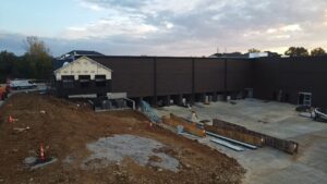 Aerial view of BestBox Storage in Lake St. Louis, Missouri—a multilevel self-storage facility with a basement, featuring a modern, suburban-style design that blends into the surrounding landscape.