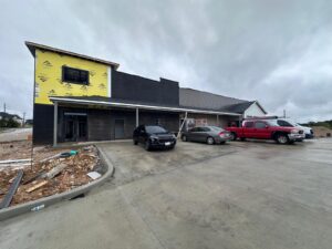 Aerial view of BestBox Storage in Lake St. Louis, Missouri—a multilevel self-storage facility with a basement, featuring a modern, suburban-style design that blends into the surrounding landscape.