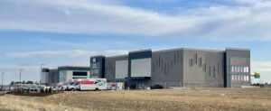 U-Haul Moving & Storage facility in Loveland, Colorado, featuring a 3-story climate-controlled building and three single-story non-climate units with drive-up access.