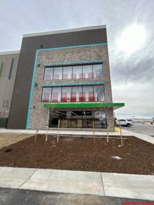Multilevel U-Haul self-storage facility under construction in Loveland, Colorado, built by Solid Steel Structures, Inc., featuring modern architecture and a basement level.