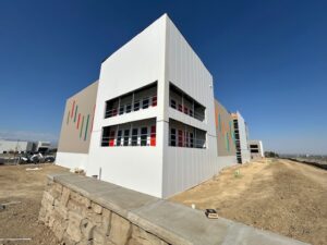 U-Haul Moving & Storage facility in Loveland, Colorado, featuring a 3-story climate-controlled building and three single-story non-climate units with drive-up access.