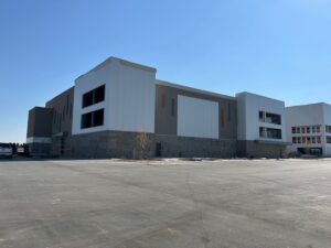 U-Haul Moving & Storage facility in Loveland, Colorado, featuring a 3-story climate-controlled building and three single-story non-climate units with drive-up access.