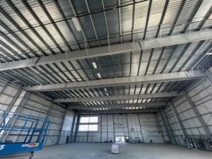 U-Haul Moving & Storage facility in Loveland, Colorado, featuring a 3-story climate-controlled building and three single-story non-climate units with drive-up access.