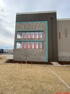 Multilevel U-Haul self-storage facility under construction in Loveland, Colorado, built by Solid Steel Structures, Inc., featuring modern architecture and a basement level.