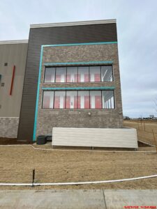 Multilevel U-Haul self-storage facility under construction in Loveland, Colorado, built by Solid Steel Structures, Inc., featuring modern architecture and a basement level.