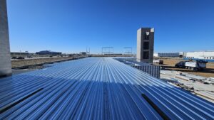 Multilevel U-Haul self-storage facility under construction in Loveland, Colorado, built by Solid Steel Structures, Inc., featuring modern architecture and a basement level.