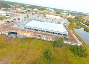 BestBox Storage – Venice, FL | 3-Story Climate-Controlled Self-Storage Facility Three-story BestBox Storage facility in Venice, Florida featuring 94,071 sq. ft. of climate-controlled self-storage units with a drive-through loading corridor.